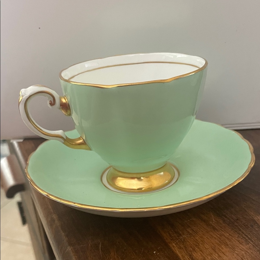 Elegant Gold-Trimmed Teacup and Saucer Set - Picture 2 of 6